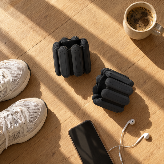 Sculpt 20 Silicone Wrist & Ankle Weights with sneakers, from above